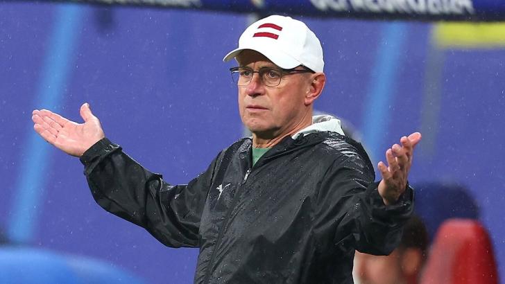 Austria coach Ralf Rangnick watches his side in action
